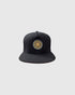 The LLC Above The Rim black snapback hat with gold wheel rim embroidered on the front crown