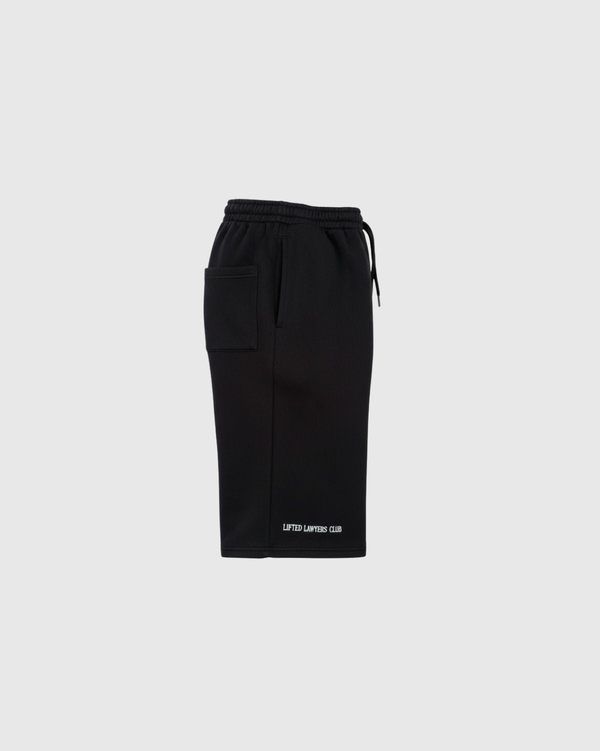 Side view of long fleece shorts with elastic waistband and logo embroidered at hem (Black)