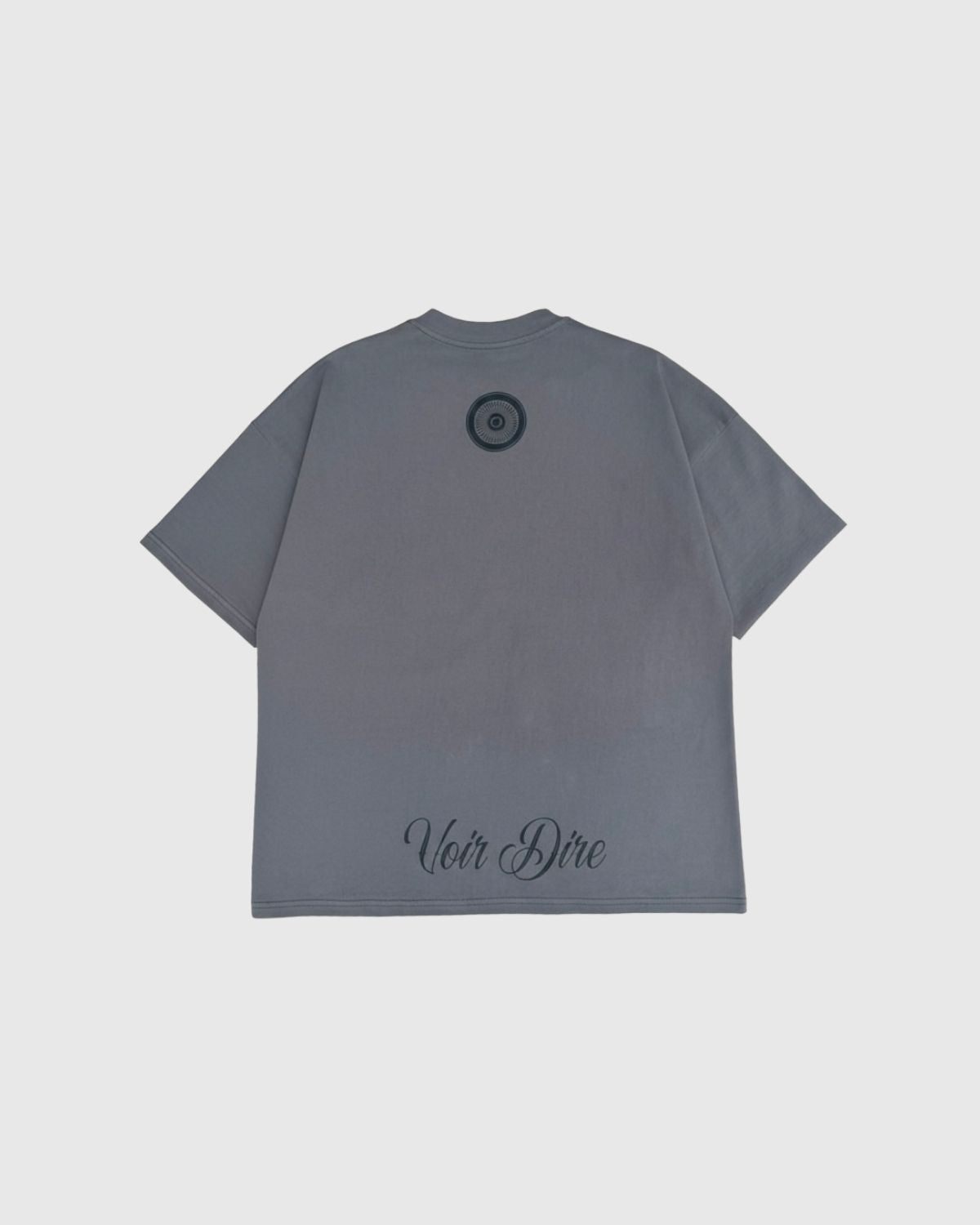 Heritage t-shirt with 'Voir Dire' text on the back against a light gray background (Gray)